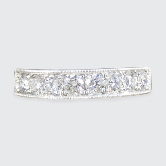 Diamond bar ring on a light gray background