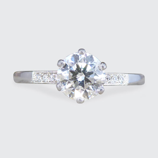 Diamond ring on a light gray background