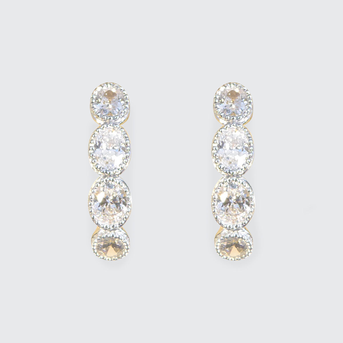 Oval Cut 0.70ct Diamond Huggie Hoop Earrings in 18ct Gold