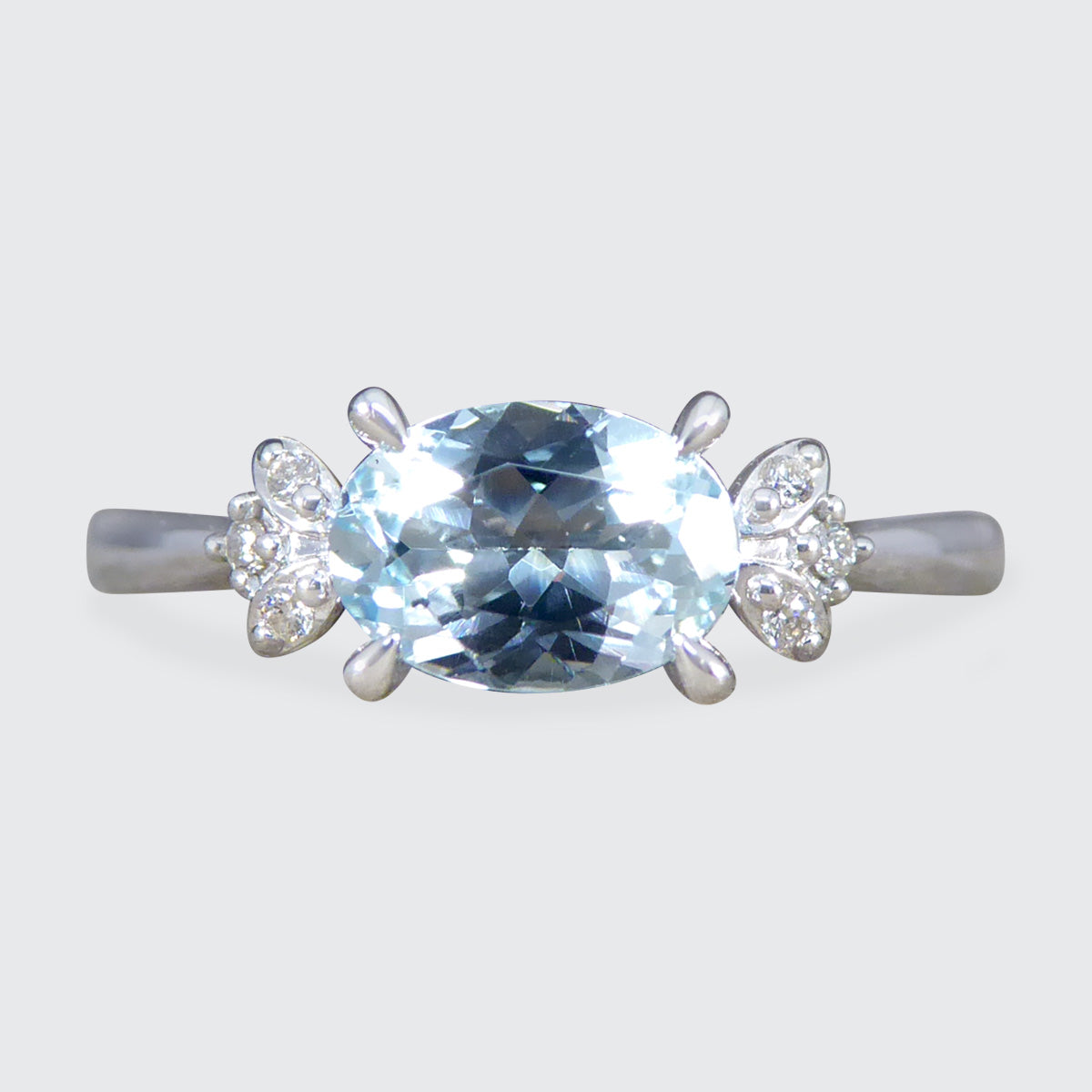 Dainty Aquamarine Ring with Diamond Set Shoulders in White Gold - Wharfedale Antiques