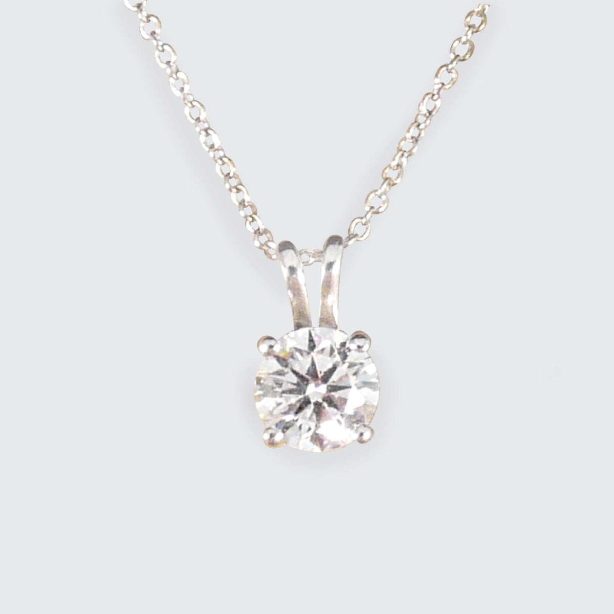 Diamond Solitaire pendant necklace in 18ct white gold on an 18ct white gold trace chain. The perfect sparkly gift.