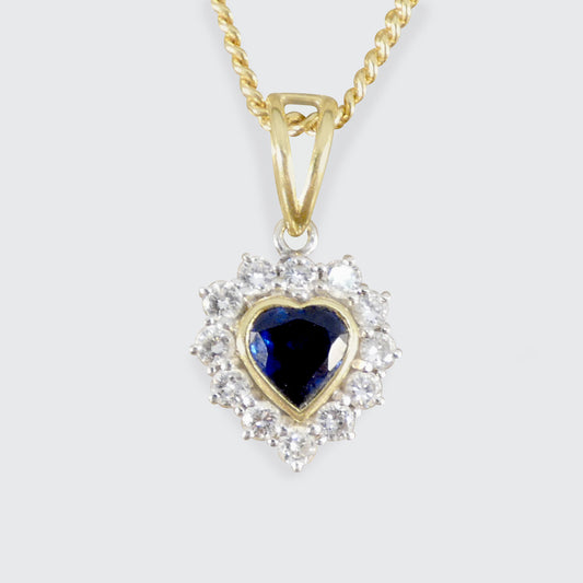 Heart shaped Sapphire and Diamond cluster pendant necklace in 18ct Yellow Gold.
