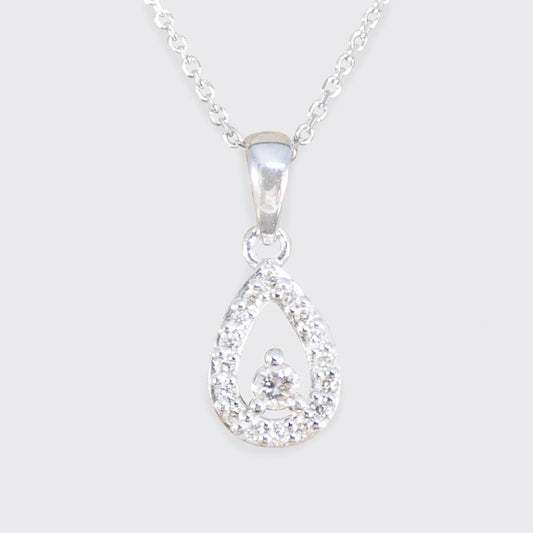 Teardrop shaped diamond cluster necklace in white gold.