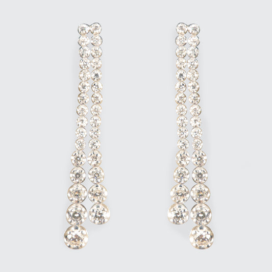 Elegant diamond drop earrings featuring independently dangling diamonds with a total carat weight of 1.13ct, set in 18ct white gold.