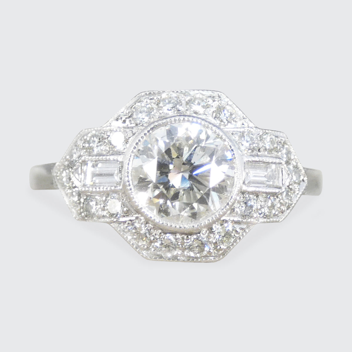 A gorgeous Art Deco inspired Diamond cluster ring in Platinum.