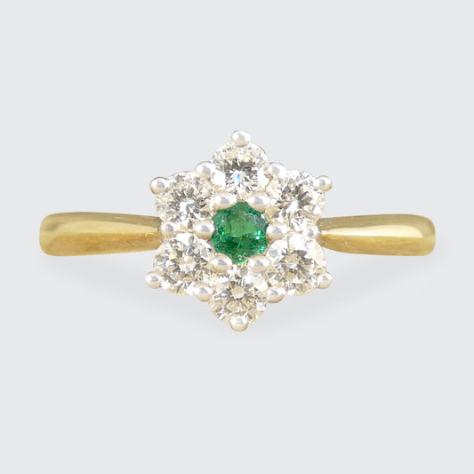 A beautiful and dainty Emerald and Diamond flower cluster ring in 18ct Yellow and White Gold