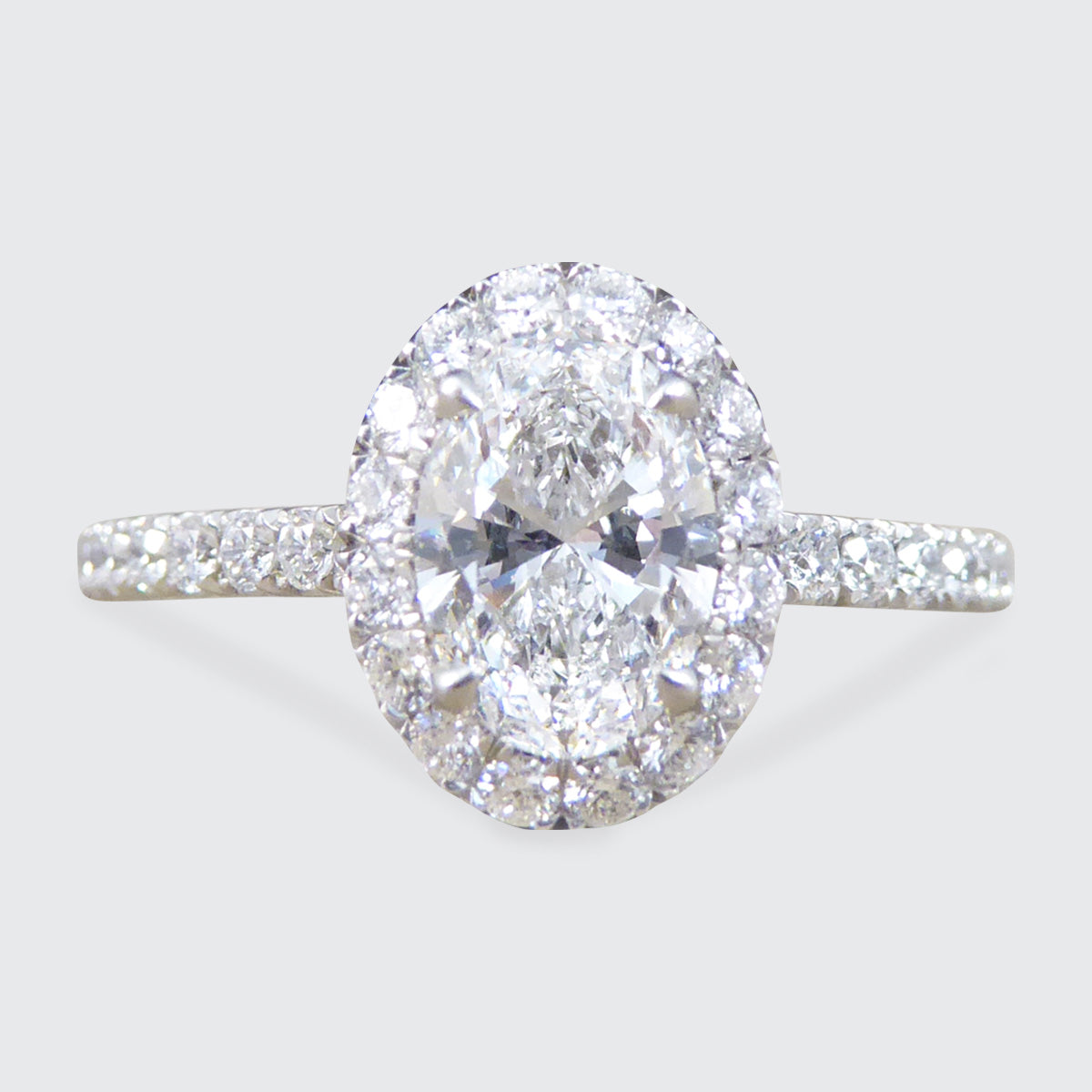 GIA D Colour Oval Cut Diamond Cluster ring with Diamond Shoulders in Platinum - Wharfedale Antiques