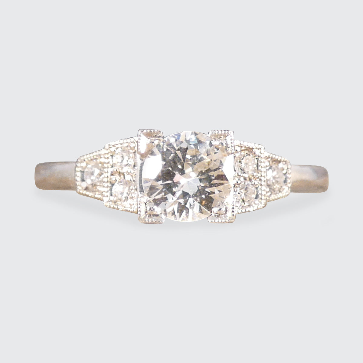 Art Deco Inspired Diamond Ring with Diamond Staged Shoulders in Platinum - Wharfedale Antiques