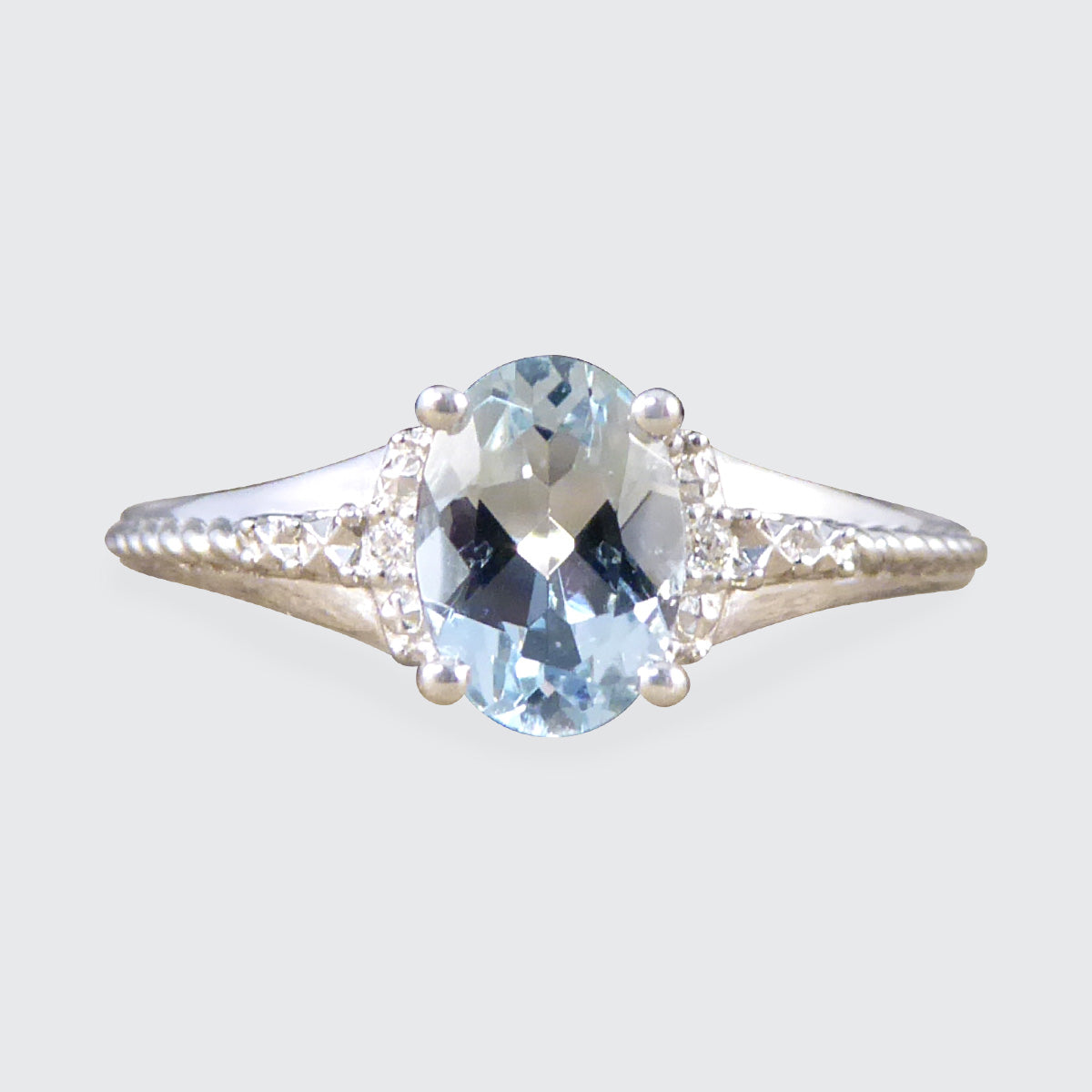 Solitaire Aquamarine and Diamond Illusion Set Ring in White Gold - Wharfedale Antiques