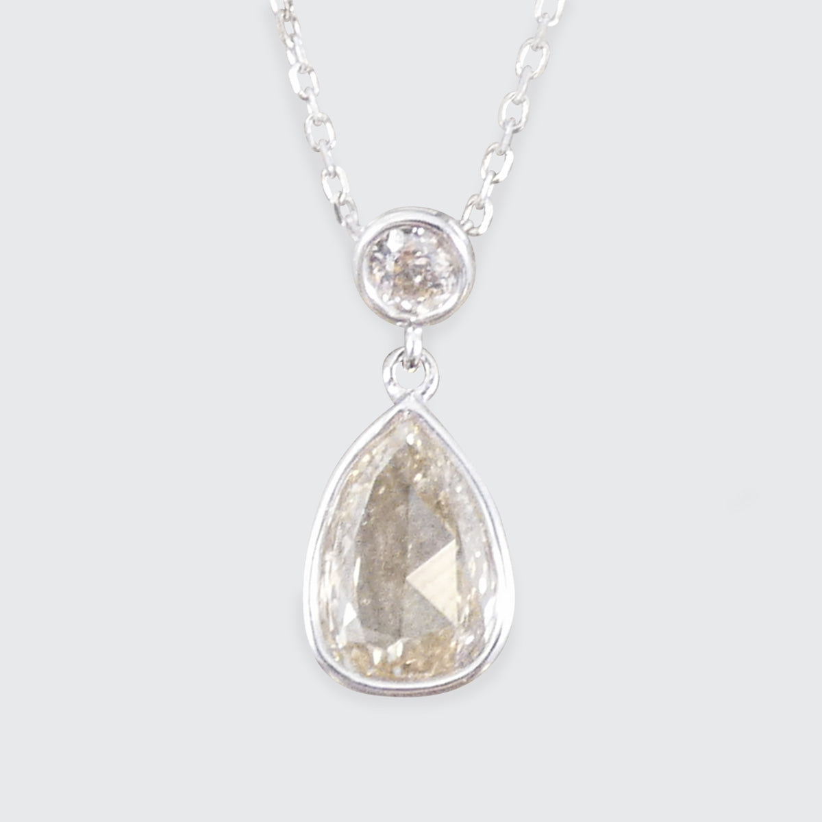Unique modified rose cut Diamond and brilliant cut drop necklace in 18ct White Gold.