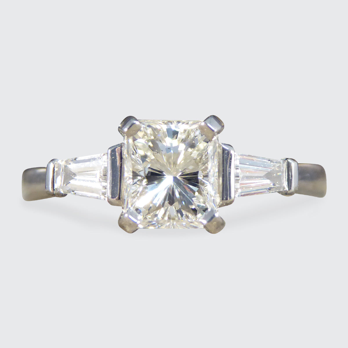 Radiant Cut Diamond Ring with Tapered Baguette Shoulder in Platinum - Wharfedale Antiques