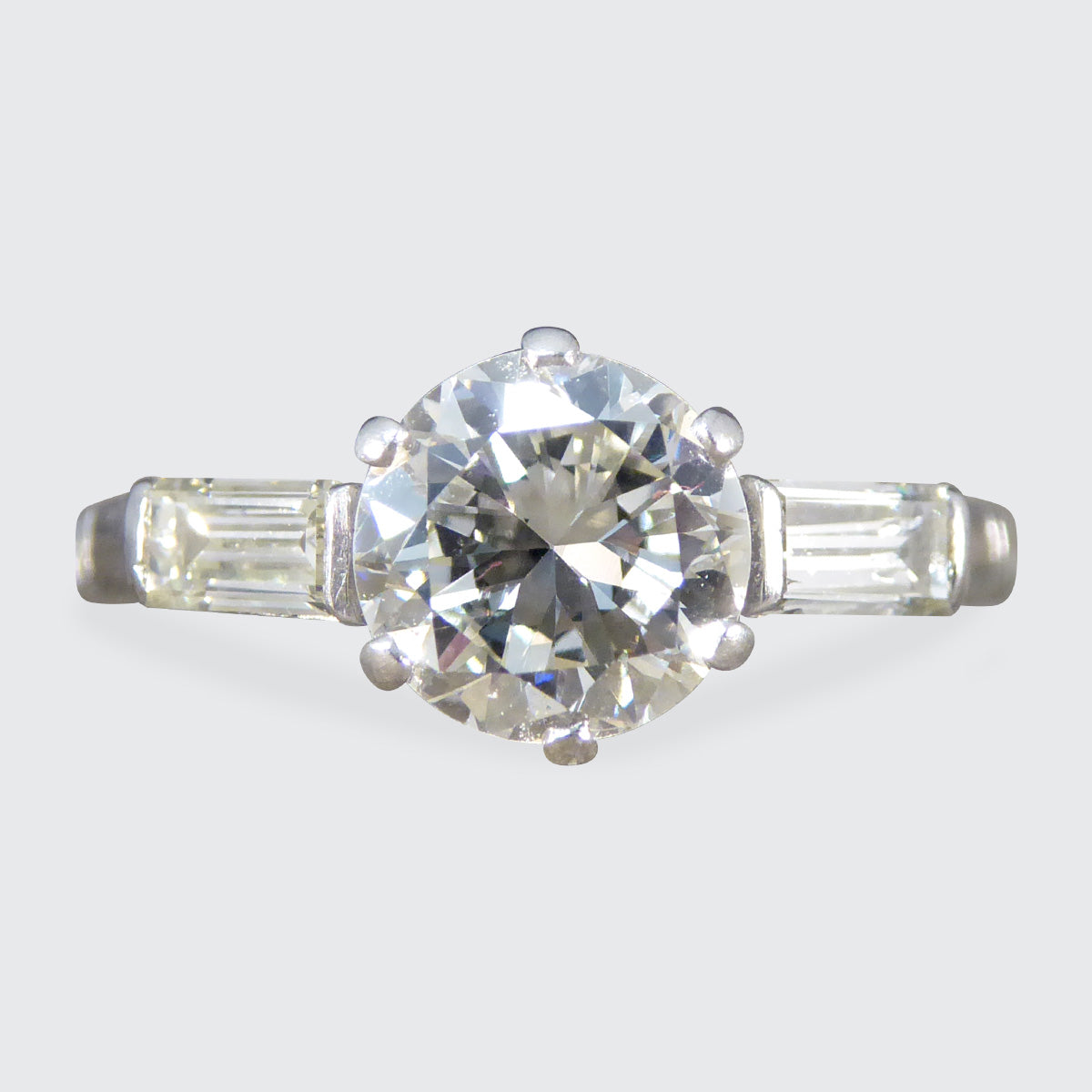 Art Deco 1.20ct Diamond Solitaire Engagement Ring with Baguette Cut Shoulders in Platinum