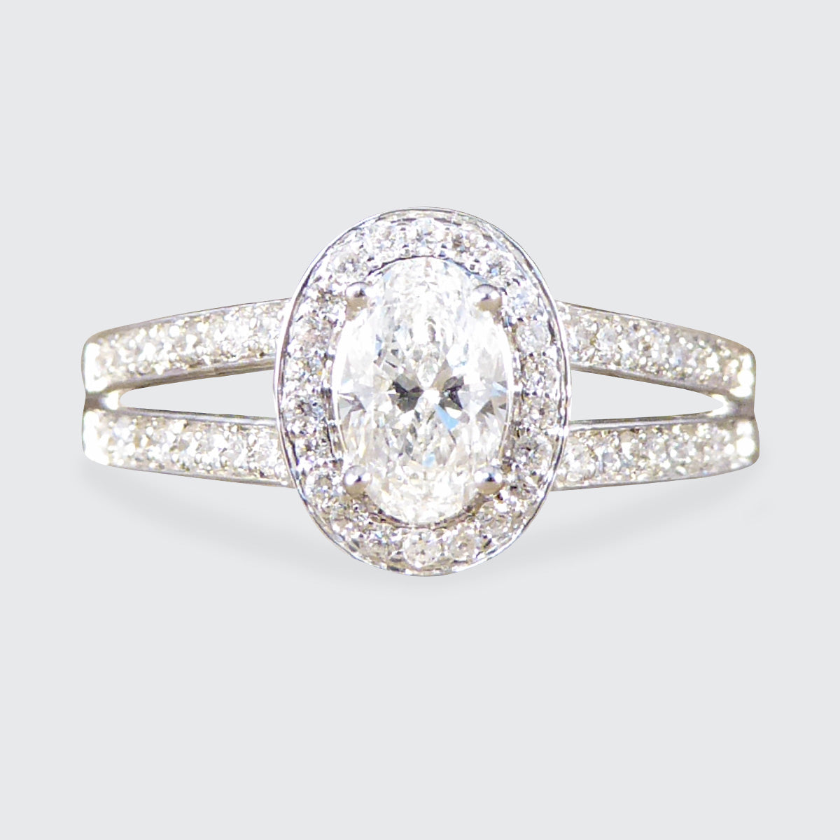 Oval Cut Diamond Cluster Ring with Diamond Set Double Strand Shoulders in 18ct White Gold