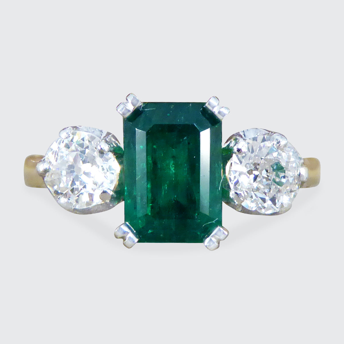 Edwardian Emerald and Diamond Trilogy Three Stone Ring in 18ct Yellow Gold and Platinum