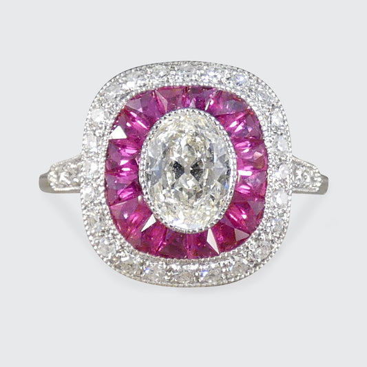 Art Deco Style Ruby and Oval Cut Diamond Target Cluster Ring in Platinum