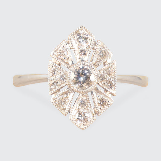 Art Deco-inspired replica ring crafted with exquisite craftsmanship in 18ct white gold, featuring intricate geometric patterns and a central diamond accent.