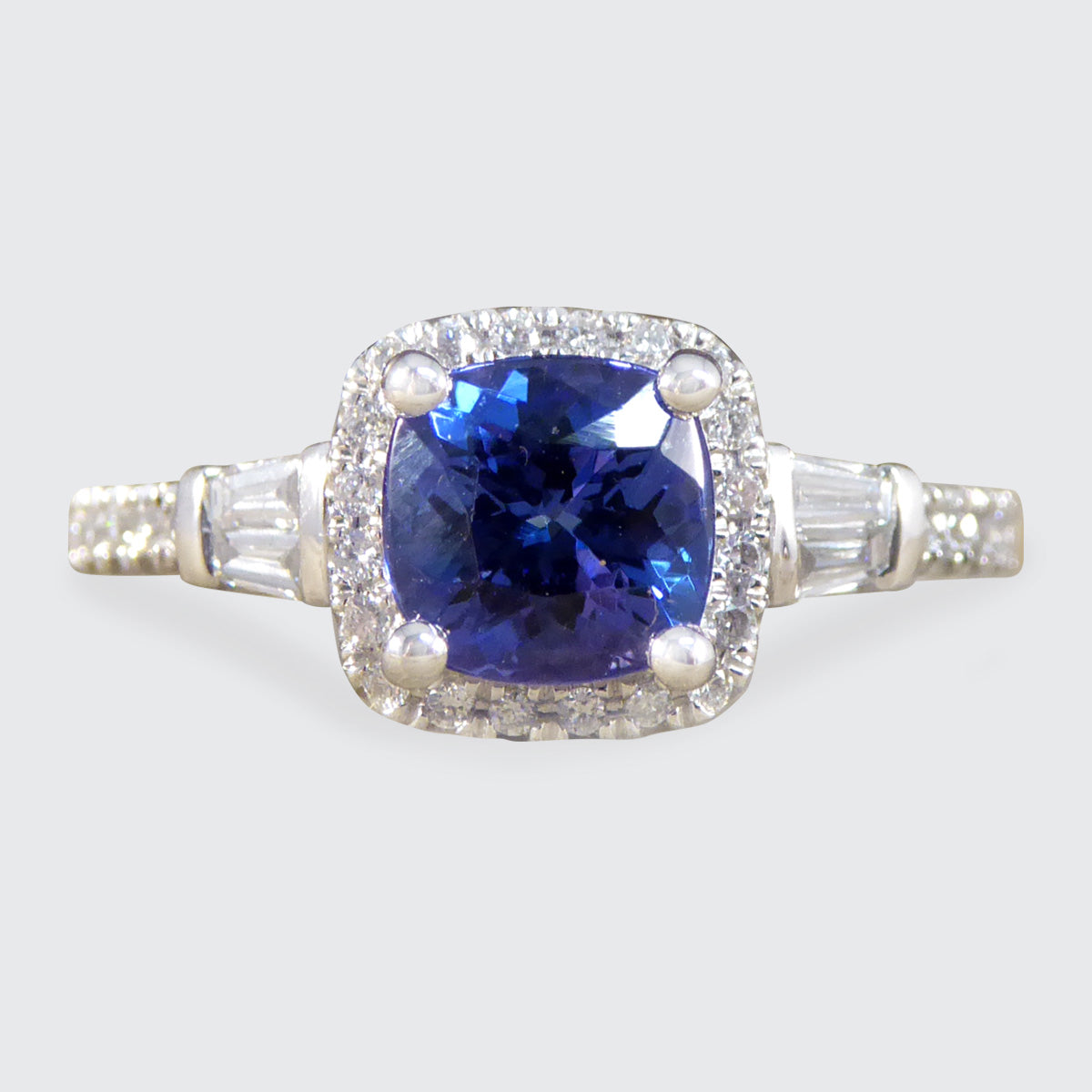 Cushion Cut Tanzanite and Diamond Cluster Ring with Tapered Baguette Shoulders in Platinum - Wharfedale Antiques