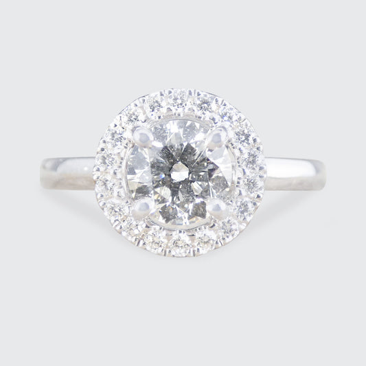 A diamond halo cluster ring with GIA certed centre stone with high colour and clarity in platinum.