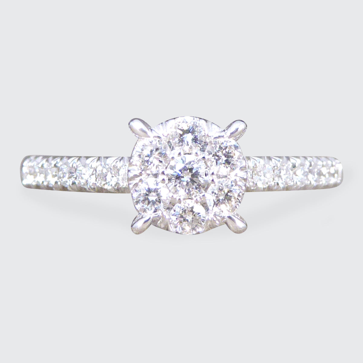 Solitaire Illusion set Diamond Cluster Ring in White Gold with Diamond Shoulders - Wharfedale Antiques