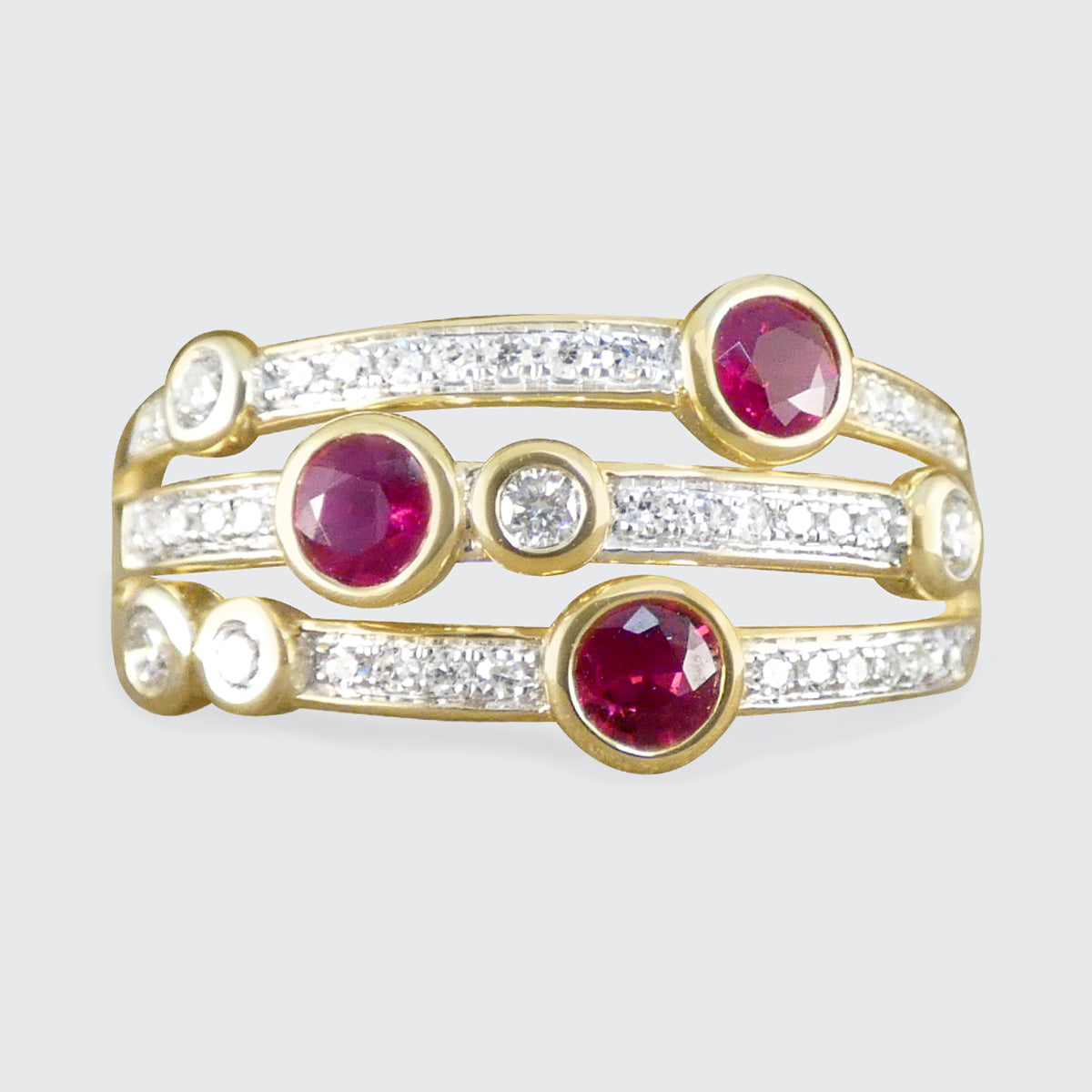 Ruby and Diamond Bubble Style Ring in 9ct Yellow Gold.