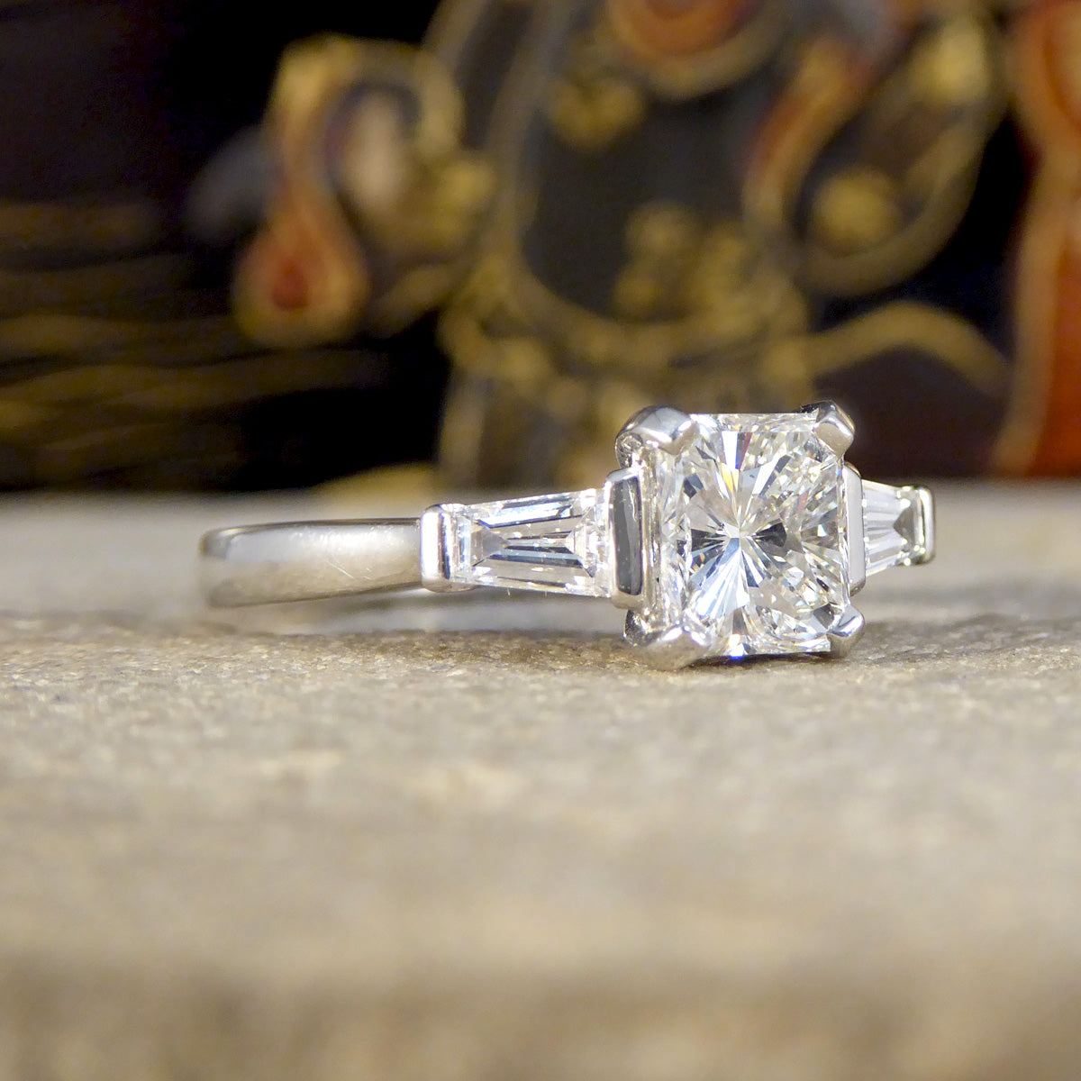 Radiant Cut Diamond Ring with Tapered Baguette Shoulder in Platinum