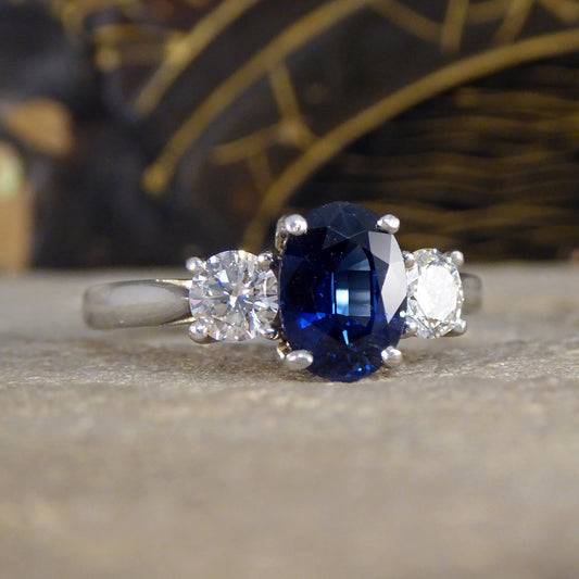 Oval Cut 1.75ct Sapphire and Diamond Three Stone Ring in Platinum - Wharfedale Antiques