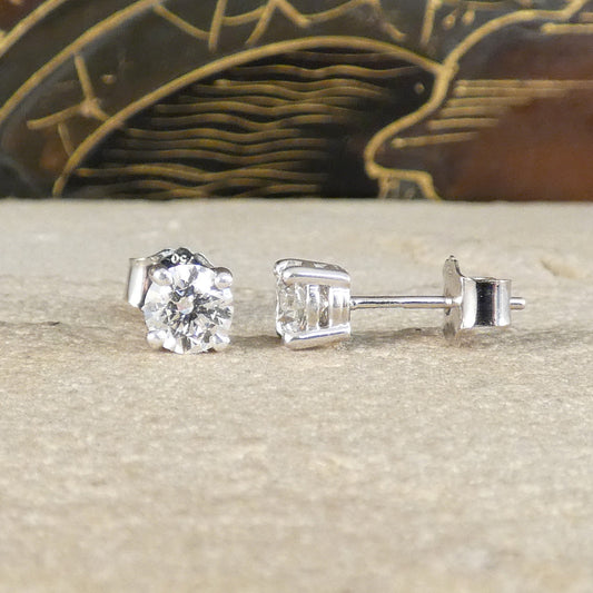 1.00ct GIA E Colour Diamond Stud Earrings in 18ct White Gold. Shown from the front and side to see the classic timeless setting.