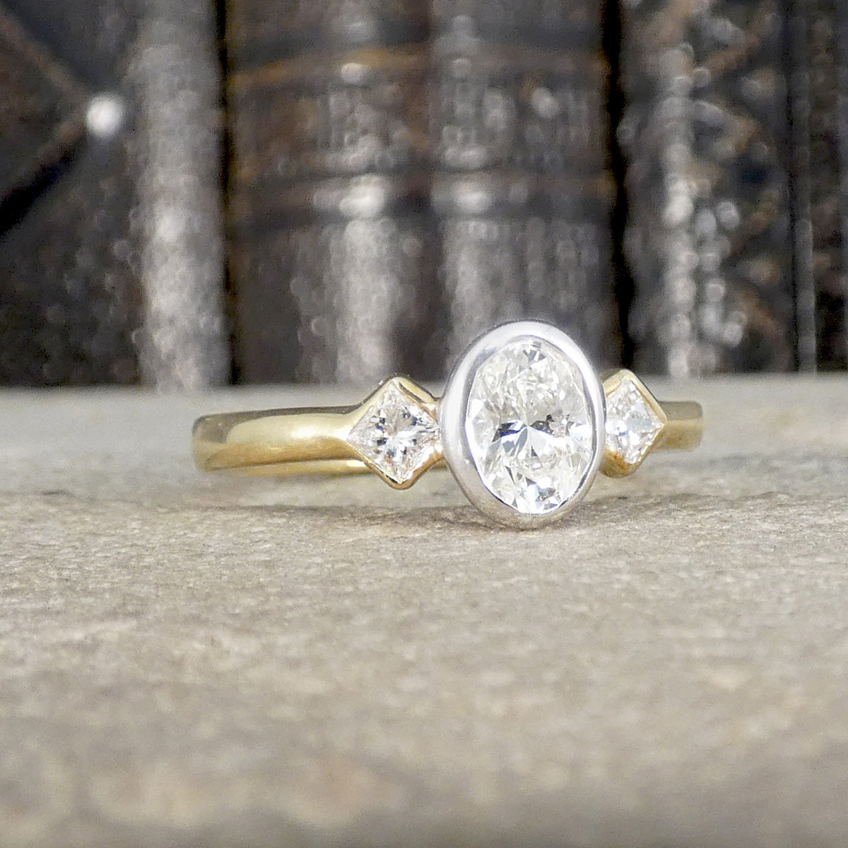 Oval and Princess Cut Diamond Three Stone Ring in 18ct White and Yellow Gold