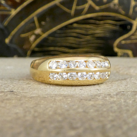 A channel set diamond double row ring in yellow gold