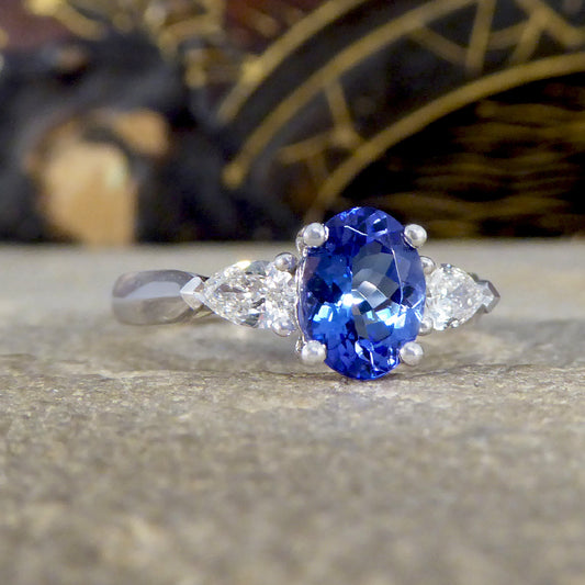 Oval Tanzanite and Pear Cut Diamond Three Stone Ring in Platinum - Wharfedale Antiques