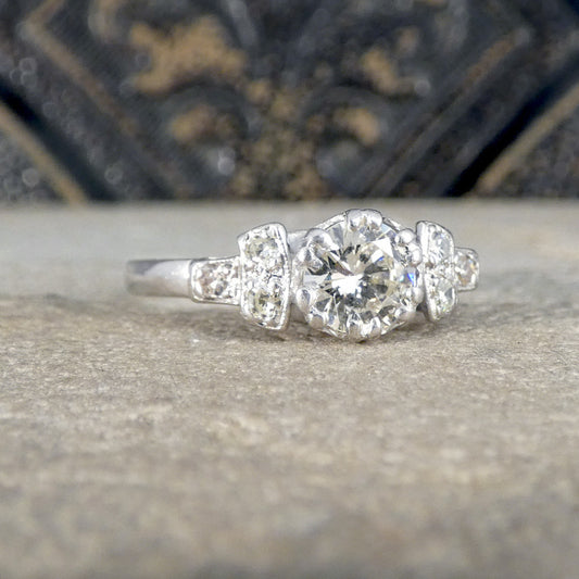 Diamond ring on a textured surface with a blurred background