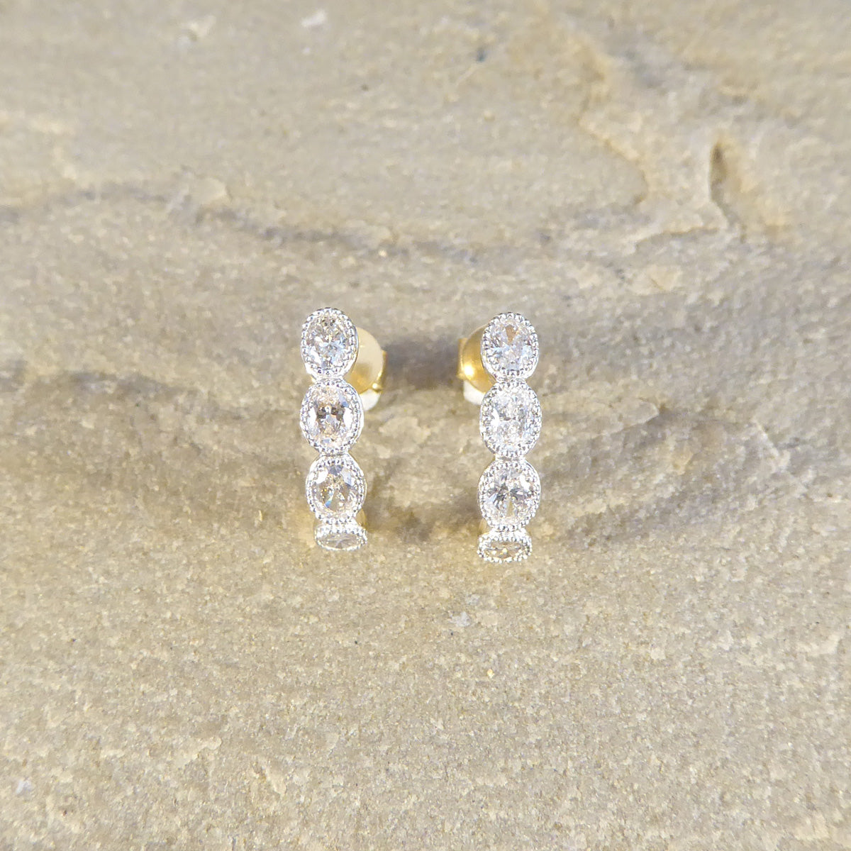 Oval Cut 0.70ct Diamond Huggie Hoop Earrings in 18ct Gold