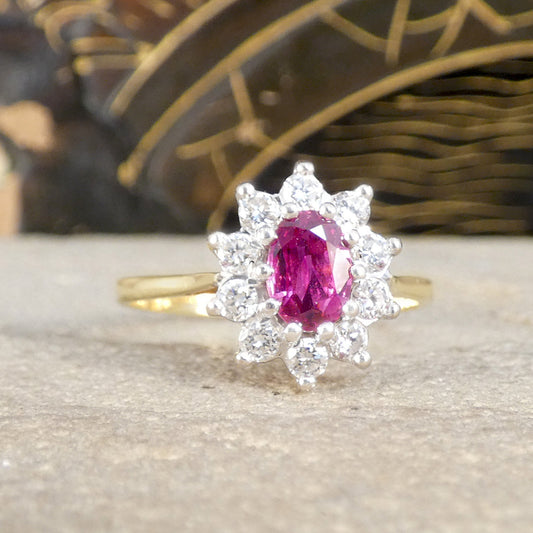 A Ruby and Diamond cluster ring in 18ct white and yellow gold.