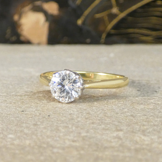 A classic diamond solitaire ring, standing the test of time. Set in White Gold leading to an 18ct Yellow Gold band.