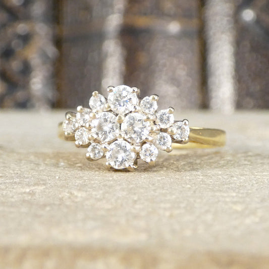 A gorgeous diamond vintage diamond cluster ring in 18ct yellow gold.