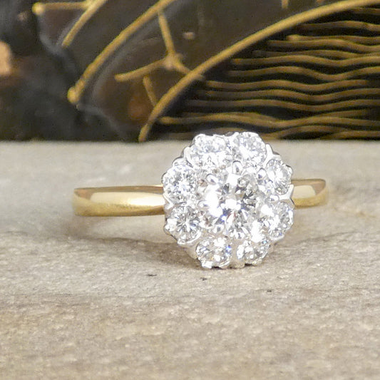 Bright and sparkly vintage early brilliant cut diamond cluster ring in 18ct White Gold with a 18ct Yellow Gold band with slihghtly tapered shoulders.