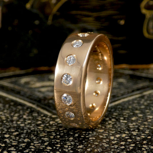 A bright and sparkly diamond set full band ring in 18ct rose gold