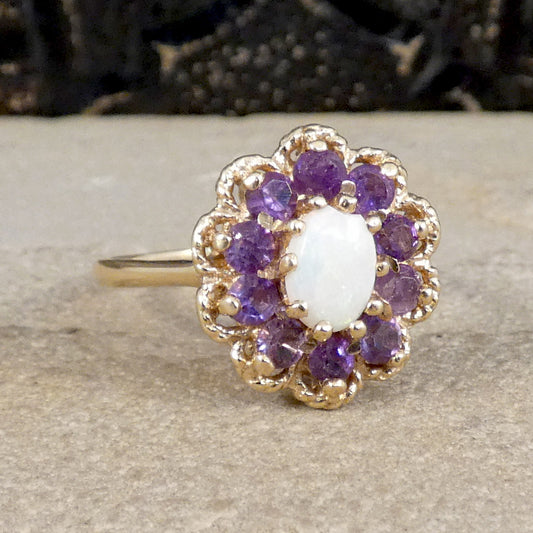 Vintage Opal and Amethyst Cluster Ring in 9ct Yellow Gold with Gold Rope Edge Detail. Amethyst showing bright purple colour with the opal showing a white milky  hue.