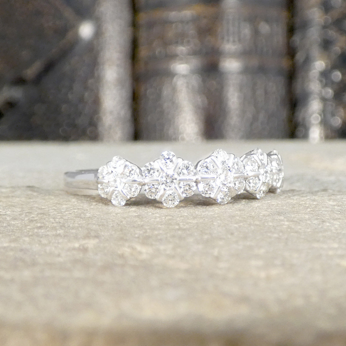 A gorgeous bright and beautiful flower cluster diamond ring in 18ct white gold.