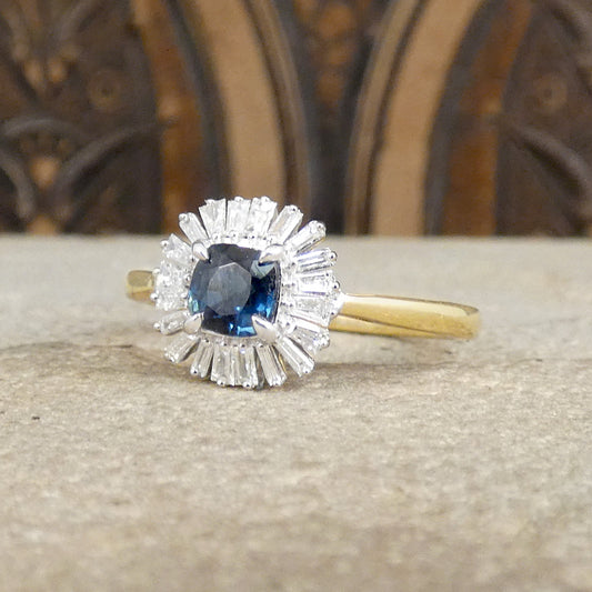 A dainty Sapphire and Diamond cluster ring, showing a floral detail and lots of sparkle.