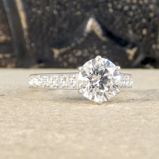 Incredibly clear and bright 1.30ct Diamond Solitaire with 0.56ct Diamond Set Shoulders in Platinum, the perfect engagement ring.