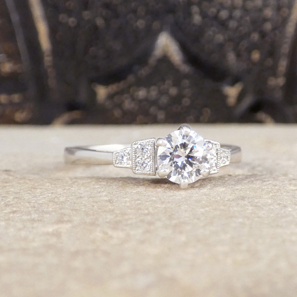 A bright and beautiful quality engagement ring in a classic Art Deco style.
