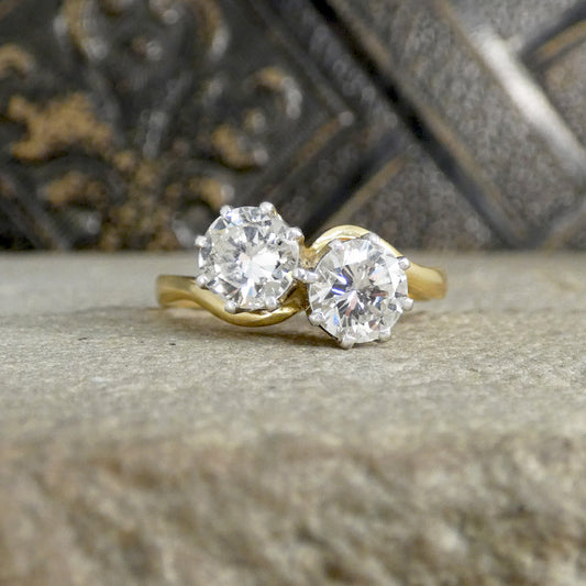 Diamond toi et moi twist ring in yellow gold