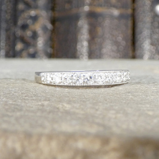 Diamond half eternity rin gin 9ct white gold.