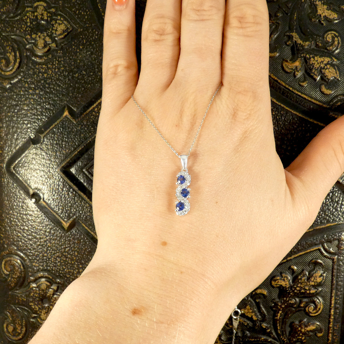 Ceylon Sapphire and Diamond Three Stone Lazy River Drop Pendant Necklace in Platinum - Wharfedale Antiques