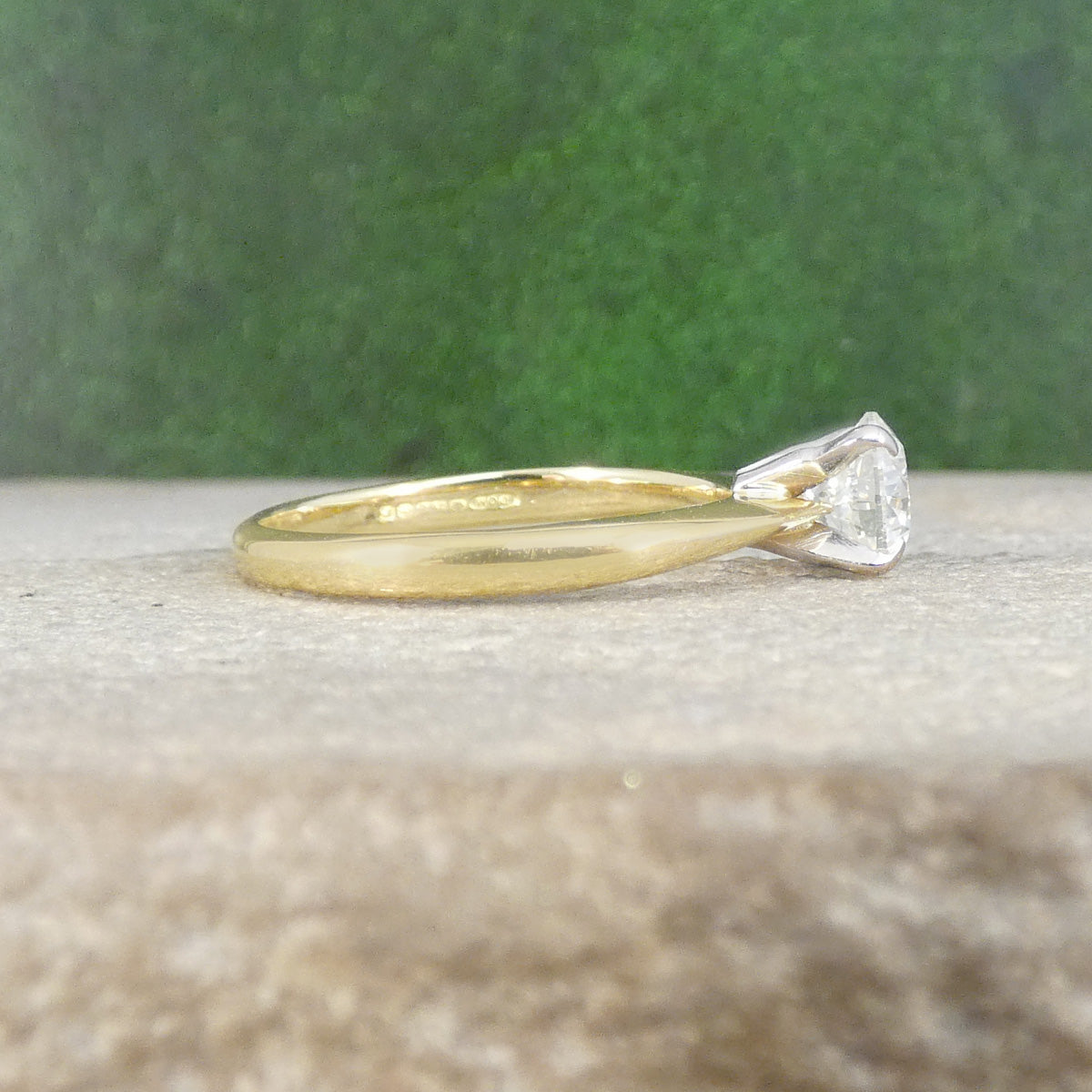 Classic Brilliant Cut Diamond Solitaire Engagement Ring in 18ct Gold high set for easier stacking.