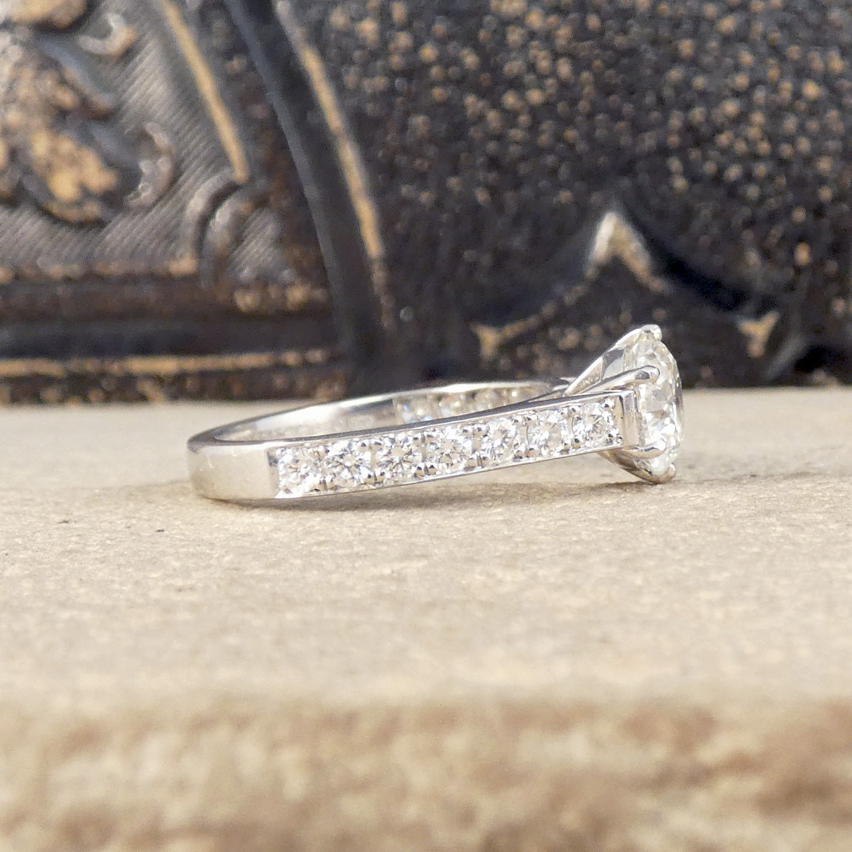 Side view of 1.30ct Diamond Solitaire with 0.56ct Diamond Set Shoulders in Platinum.