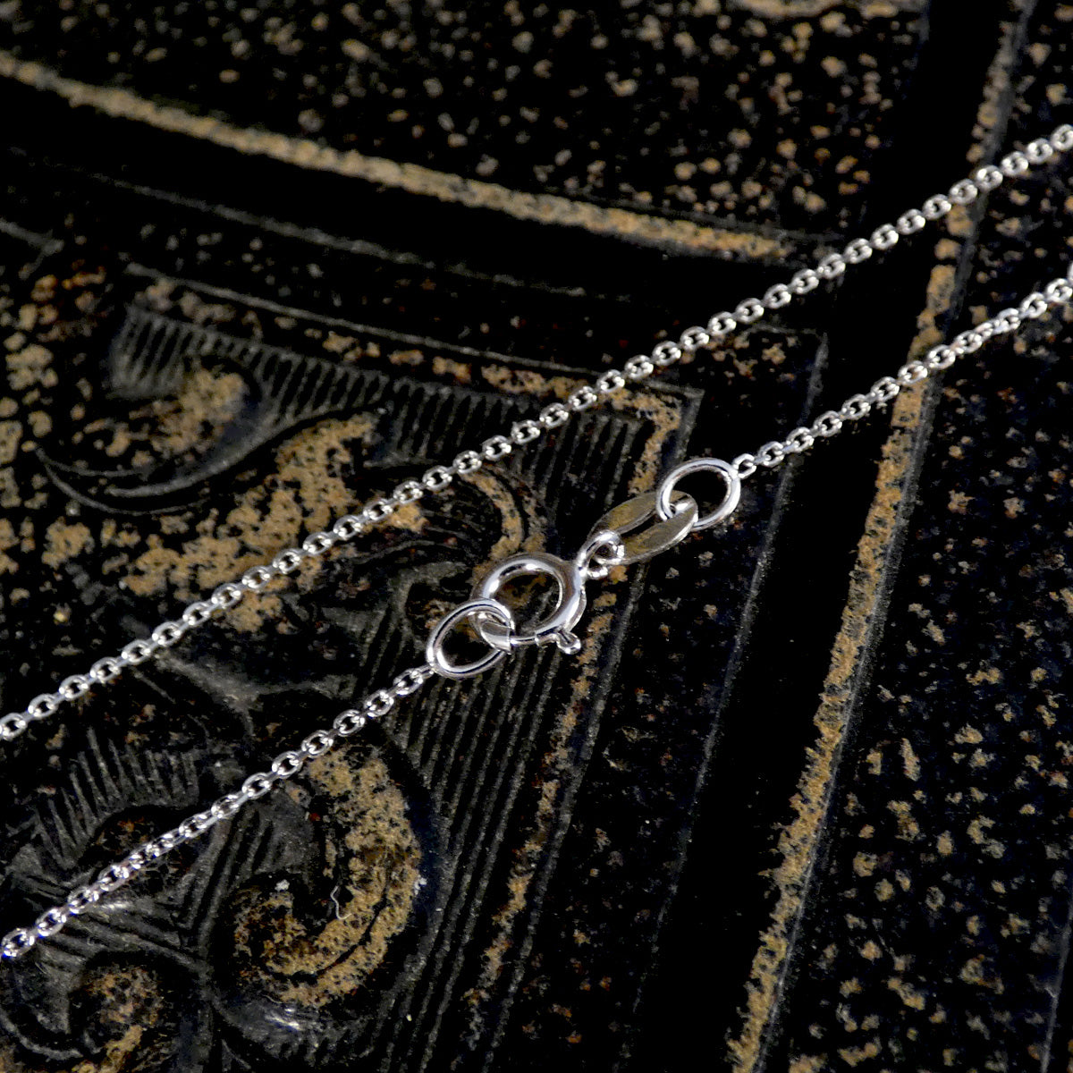 bolt clasp on 9ct white gold chain.