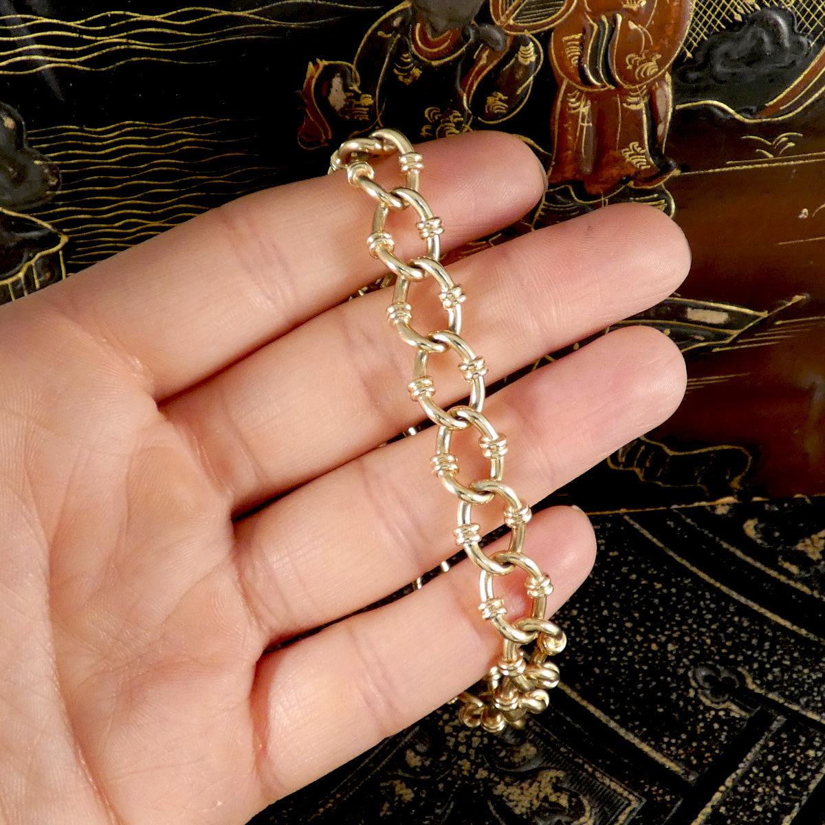 Vintage Fancy Link Bracelet in 9ct Yellow Gold shown on hand to see colour and size ratio.