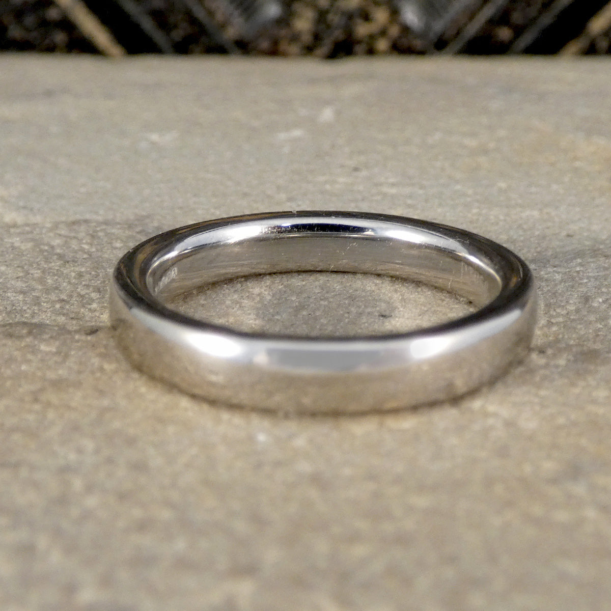 Platinum ring from behind showing the court inner band.